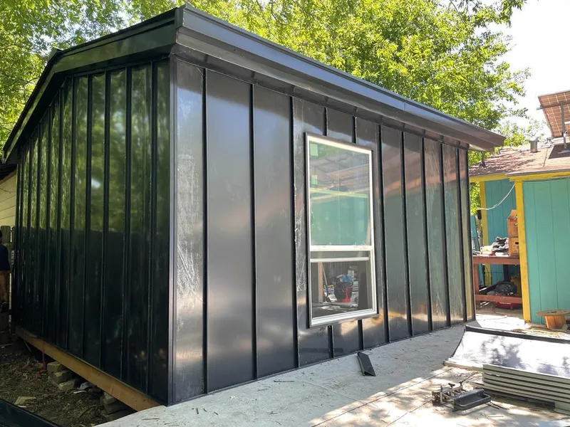 Black standing seam metal wall panels for Metal Roof Installation in Millcreek